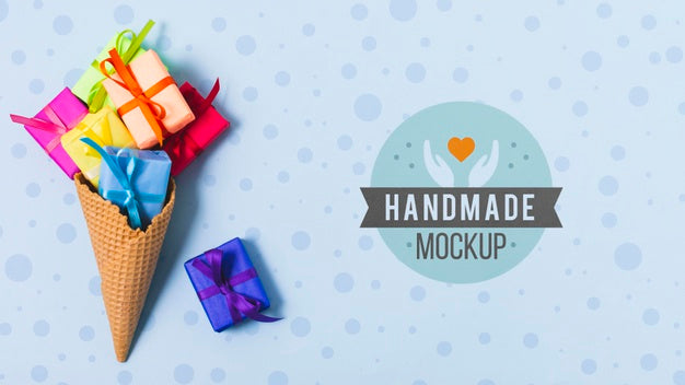 Top View Of Ice Cream Cone With Presents And Copy Space Psd