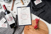 Top View Of Menu With Wine Bottle And Chili Peppers Psd