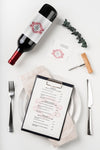 Top View Of Menu With Wine Bottle And Cutlery Psd