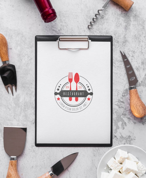 Top View Of Menu With Wine Bottle And Utensils Psd