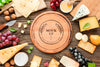 Top View Of Mock-Up Assortment Of Locally Grown Cheese With Grapes Psd