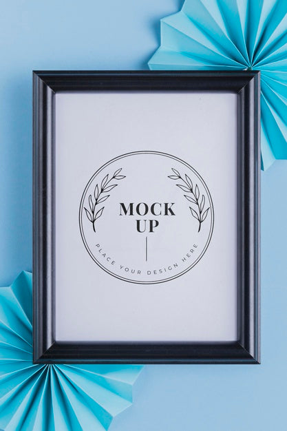 Top View Of Mock-Up Frame With Paper Rosettes Psd