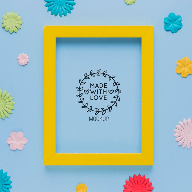 Top View Of Mock-Up Frame With With Colorful Paper Decorations Psd