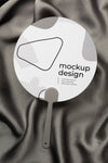 Top View Of Mock-Up Hand Fan On Black Textile Psd