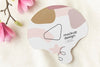 Top View Of Mock-Up Hand Fan With Magnolia Flowers Psd
