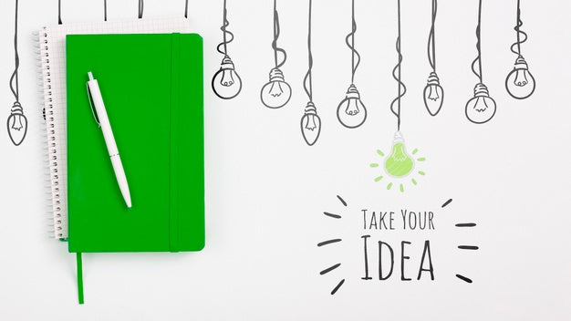 Top View Of Notebook And Pen Psd