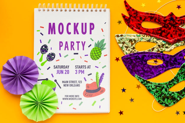 Top View Of Notebook With Carnival Masks Psd