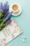 Top View Of Notebook With Coffee And Spring Flowers Psd