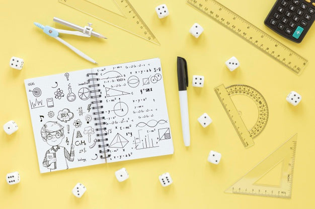 Top View Of Notebook With Different Rulers And Calculator Psd