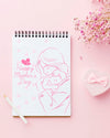 Top View Of Notebook With Flowers And Present Psd