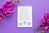 Top View Of Notebook With Orchid Psd