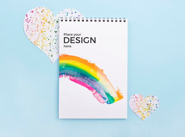 Top View Of Notebook With Rainbow And Heart Psd