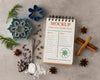 Top View Of Notebook With Snowflake Forms And Cinnamon Psd