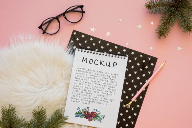 Top View Of Notebook With Spruce Branch And Fur Psd