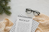 Top View Of Notebook With Spruce Branch And Glasses Psd
