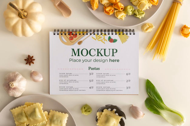 Top View Of Notebook With Vegetables And Pasta Psd