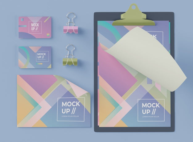 Top View Of Notepad With Card And Paper Clips Psd