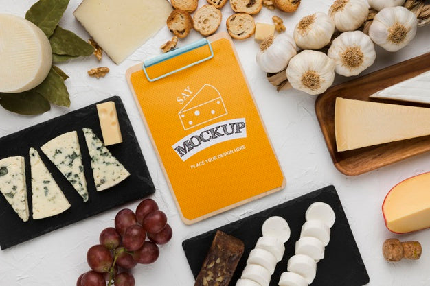 Top View Of Notepad With Cheese And Garlic Psd
