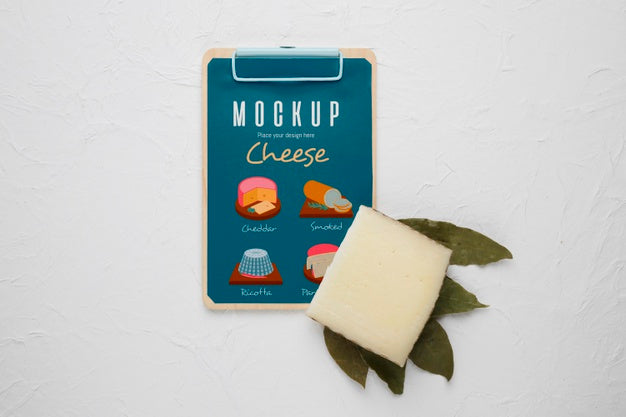 Top View Of Notepad With Cheese Psd