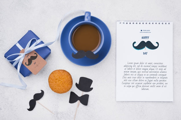 Top View Of Notepad With Gift And Coffee For Fathers Day Psd
