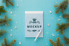 Top View Of Notepad With Spruce Branches And Pen Psd