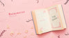 Top View Of Open Book And Flowers Psd