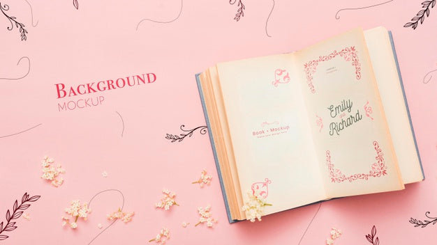 Top View Of Open Book And Flowers Psd