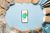 Top View Of Paper Cups And Zero Waste Items With Smartphone Psd
