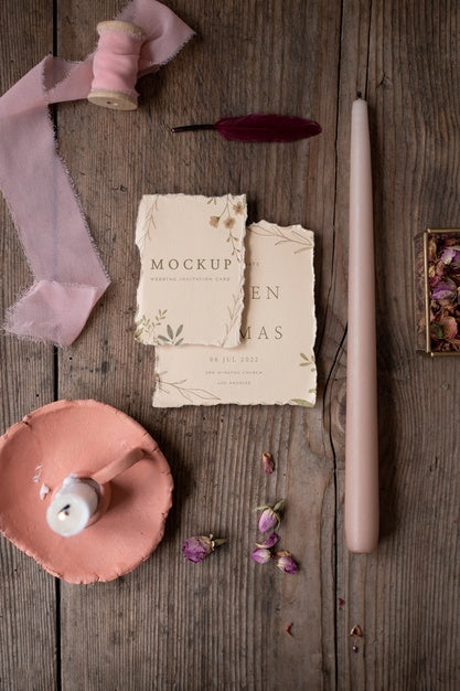 Top View Of Paper Mock-Up Rustic Wedding Invitation With Leaves And Flowers Psd