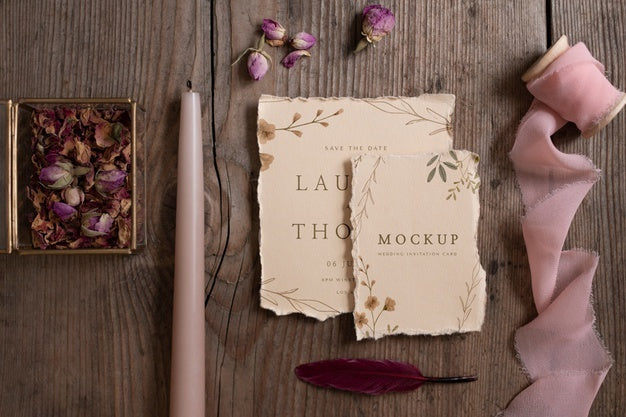 Top View Of Paper Mock-Up Rustic Wedding Invitation With Leaves And Flowers Psd