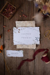 Top View Of Paper Mock-Up Rustic Wedding Invitation With Leaves And Flowers Psd