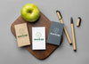 Top View Of Paper Stationery With Apple And Pencils Psd