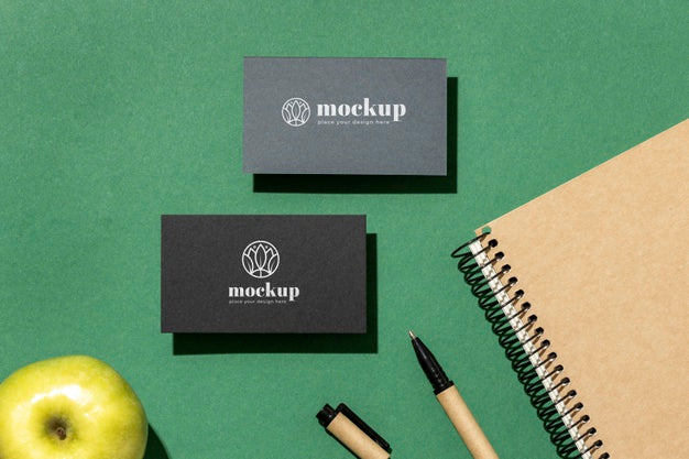 Top View Of Paper Stationery With Apple Psd
