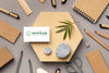 Top View Of Paper Stationery With Stones, Leaf And Pencils Psd