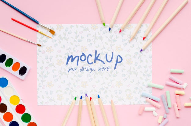 Top View Of Paper With Pencils And Brushes Psd