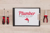 Top View Of Plumber Tools With Notepad Psd