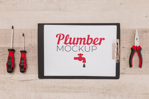 Top View Of Plumber Tools With Notepad Psd