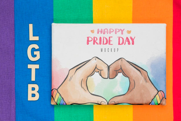 Top View Of Rainbow Flag With Greeting Psd