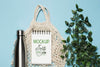 Top View Of Reusable Bag With Plant And Bottle Psd