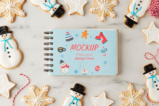 Top View Of Snowflake And Snowman Cookies Psd
