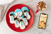 Top View Of Snowman Cookies With Mug And Smartphone Mock-Up Psd