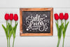 Top View Of Spring Red Tulips And Blackboard Psd