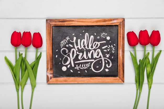 Top View Of Spring Red Tulips And Blackboard Psd