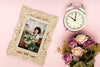 Top View Of Spring Rose Bouquet With Clock And Frame Psd