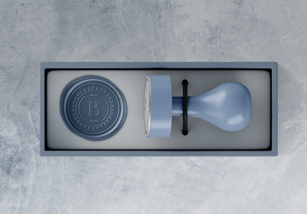 Top View Of Stamp Mockup In Box Psd