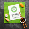 Top View Of Sushi With Chopsticks And Soy Sauce On Bamboo Roller Psd