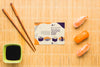 Top View Of Sushi With Chopsticks And Soy Sauce Psd