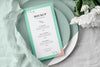 Top View Of Table Arrangement With Spring Flowers And Menu Mock-Up Psd