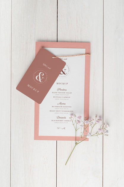 Top View Of Table Arrangement With Spring Menu Mock-Up And Blossom Psd