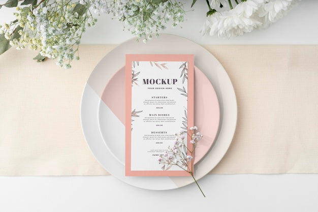 Top View Of Table Arrangement With Spring Menu Mock-Up And Flowers Psd
